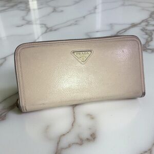 Prada Saffiano Leather Zip Around Long Wallet in a beige Calfskin Leather